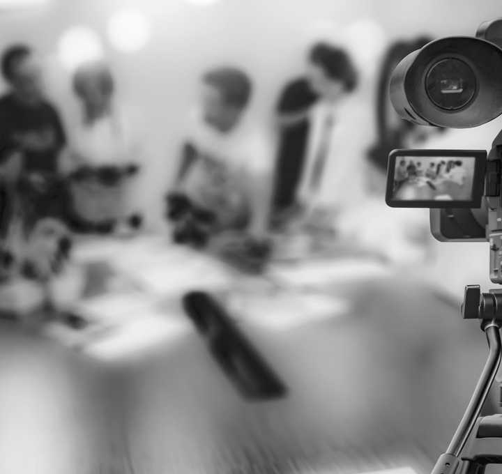 studio camera videoing people